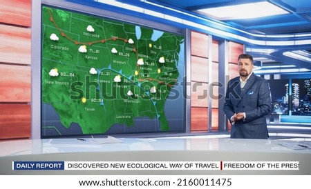 TV Weather Forecast Program: Professional Television Host Reviewing Weather Report in Newsroom Studio, Uses Big Screen with Visuals. Famous Anchorman Talks. Mock-up Cable Channel Concept. Royalty-Free Stock Photo #2160011475