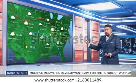 TV Weather Forecast Program: Professional Television Host Reviewing Weather Report in Newsroom Studio, Uses Big Screen with Visuals. Famous Anchorman Talks. Mock-up Cable Channel Concept. Royalty-Free Stock Photo #2160011489