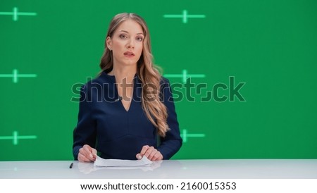Newsroom TV Studio Live News Program with Green Screen Background: Female Presenter Reporting, Talking. Television Cable Channel Anchorwoman. Network Broadcast Mock-up Playback with Tracking Markers