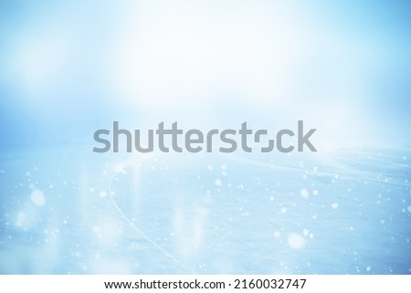 WINTER SPORT ICE HOCKEY FIELD WITH GLOWING ICY SURFACE AND BLUE WHITE HAZE AND GLANCE Royalty-Free Stock Photo #2160032747