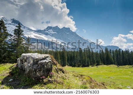 The magnificent Swiss Alps. Mountain peaks and lakes. Incredible mountain landscape