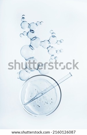 Abstract cosmetic laboratory. Chemical laboratory research. Cosmetic Essence Molecule Bubble Royalty-Free Stock Photo #2160126087
