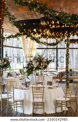 Table set for wedding or another catered event dinner. Royalty-Free Stock Photo #2160142985