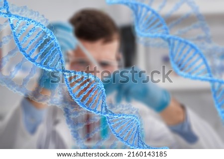 Scientist with tube pcr and virtual screen with data scientific at genetic engineering lab. Biomedical engineer genetic working with tubes in biotechnical laboratory Royalty-Free Stock Photo #2160143185