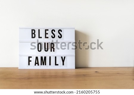 Bless Our Family Lightbox on Wooden Table