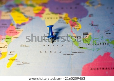 showing Indian ocean on world map with push pin Royalty-Free Stock Photo #2160209453