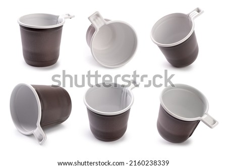 Brown empty plastic cup isolated on white background.