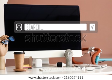 Modern computer at workplace. Concept of search