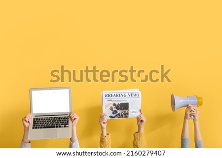 People with newspaper, laptop and megaphone on yellow background