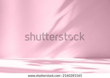 Abstract pink color gradient studio background for product presentation. Empty room with shadows of window and flowers and palm leaves . 3d room with copy space. Summer concert. Blurred backdrop. Royalty-Free Stock Photo #2160281565