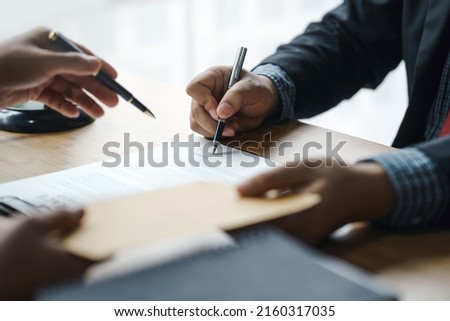 The Legal Execution Department makes an appointment with the customer to sign a mediation agreement to pay the debt. Royalty-Free Stock Photo #2160317035