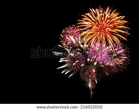 Fireworks light up the sky with dazzling display Royalty-Free Stock Photo #216032050