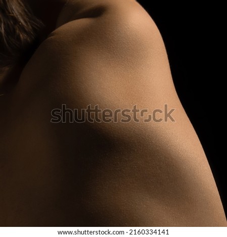 Shoulder. Female body texture. Closeup part of woman's body. Skincare, healthcare, hygiene and medicine concept. Macro photography. Art, natural beauty concept. Design for abstract artwork, picture