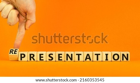 Presentation representation symbol. Businessman turns a cube, changes words presentation to representation. Beautiful orange background, copy space. Business, presentation or representation concept. Royalty-Free Stock Photo #2160353545