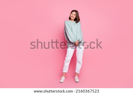 Full body photo of young pretty lady wonder look empty space modern outfit isolated over pink color background Royalty-Free Stock Photo #2160367523