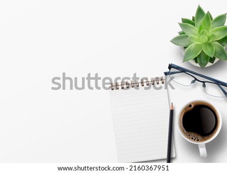 Blank notebook, offee,glasses and other office equipment on white office desk. Top view with copy space, flat lay.