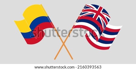 Crossed and waving flags of Colombia and The State Of Hawaii. Vector illustration
