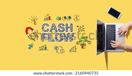 Cash flow with person working with a laptop