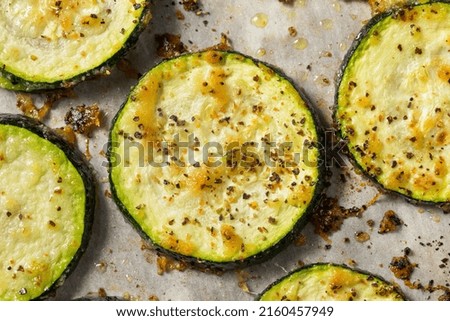 Homemade Roasted Zucchini Slices with Salt and Pepper Royalty-Free Stock Photo #2160457949