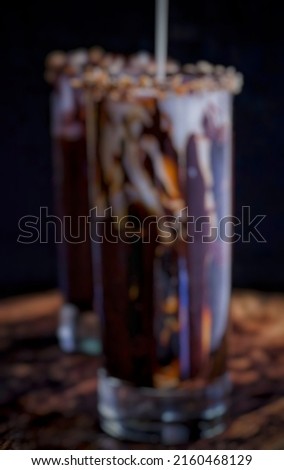 two glasses of ice cream mixed with a blend of chocolate and topping at a restaurant in Jakarta Indonesia