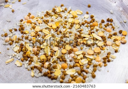 Groats grain close-up. Natural cereals. Food whole grain cereals.Natural dietary vegetarian cereals. Royalty-Free Stock Photo #2160483763