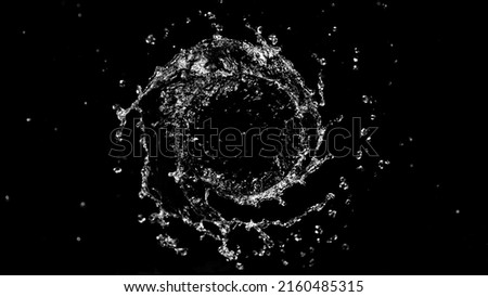 Abstract twister shape of water splash, isolated on black background.