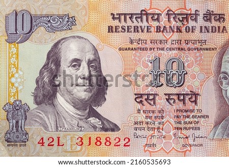 old 10 Indian rupee obverse with superimposed Benjamin Franklin from 100 dollar banknote for design purpose