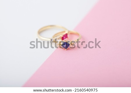 Diamond rings on pink and white background. Jewelry image for e-commerce, online selling and social media.