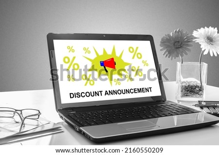 Laptop screen showing discount announcement concept