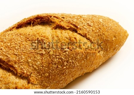 one loaf of bread close-up on a white background