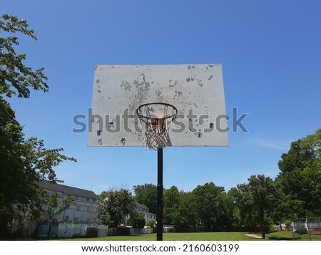 Basketball Backboard in Front of Park 