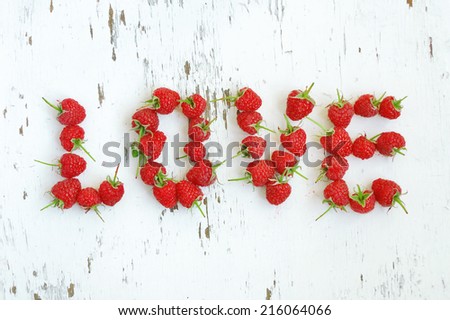 word love made of raspberry