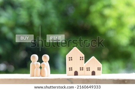 Family and Real estate concepts, Father mother and children stands near the house making decision buy or rent property choice
