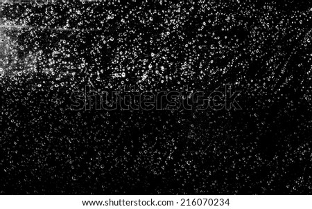 drops of water on a black background, abstract