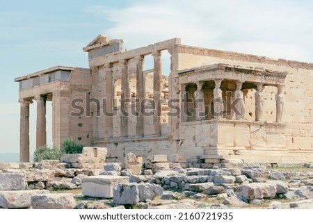 The Parthenon is a former temple on the Athenian Acropolis, Greece, dedicated to the goddess Athena, whom the people of Athens considered their patroness. Construction started in 447 BC  Royalty-Free Stock Photo #2160721935