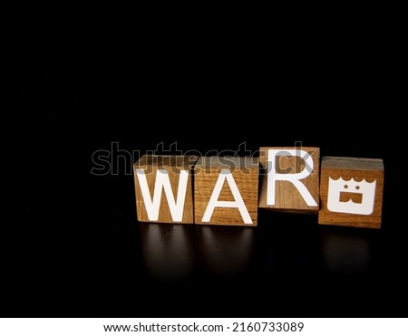 The letters on the square shape are arranged as the word war.