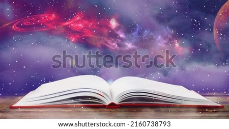 Open book with glitter overlay and beautiful universe on background