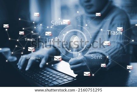 Email spam with laptop and virus internet security concept, woman touch scan fingerprint delete email spam with a laptop. Spam, junk and e-marketing on screen, Spam Email Pop-up Warning.