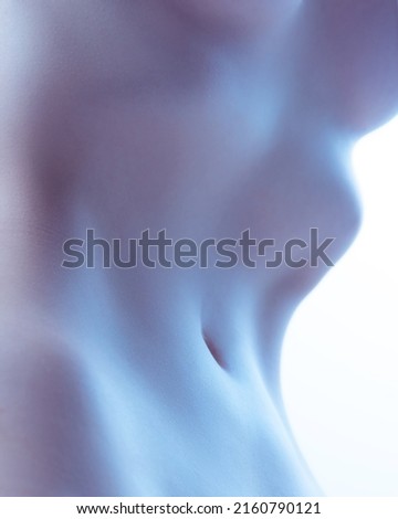 Female body texture. Perfect slim shape of woman's body, belly isolated over white background. Body art. Concept of beauty, textured effect, self-love, acceptance. Design for abstract artwork, poster Royalty-Free Stock Photo #2160790121