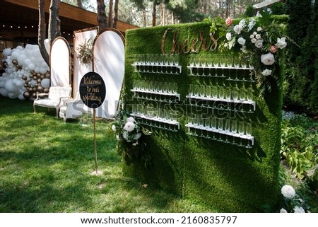 Champagne glass stand at a wedding party. Royalty-Free Stock Photo #2160835797