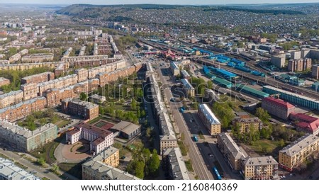 Architecture of the Soviet Union from above. Aerial photography, aerial view of the city of Novokuznetsk in spring and summer, central district, Kemerovo region, Russia
