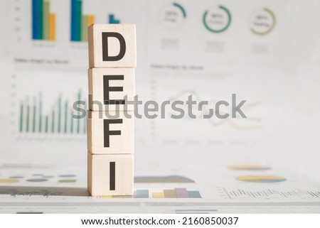 Word defi made with wood building blocks, stock image