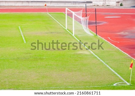 Conner of soccer field with flag,Soccer field,goal is empty goal