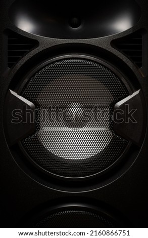 Professional speaker box for loud music. Listen to electronic musical tracks on sound system. Powerful cabinet monitor spealers for DJ. Curated collection of royalty free music photos on shutter stock