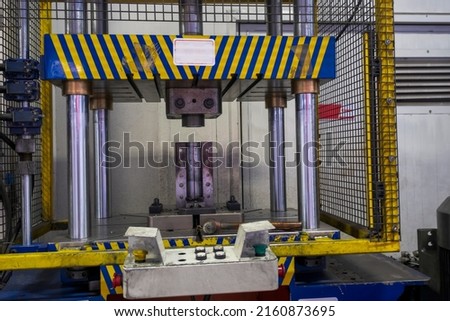Automation hydraulic press stamping machine production line. Industrial metalworking machinery Royalty-Free Stock Photo #2160873695