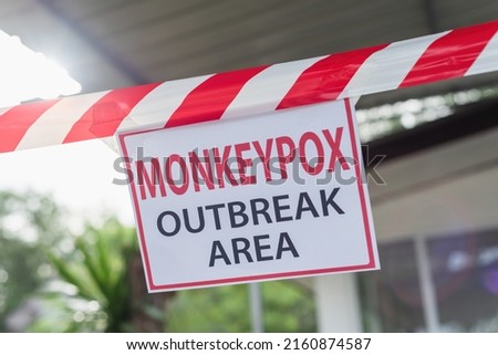 Monkeypox outbreak concept. Message paper and barriers, notice, do not enter the area. during the monkeypox virus epidemic.