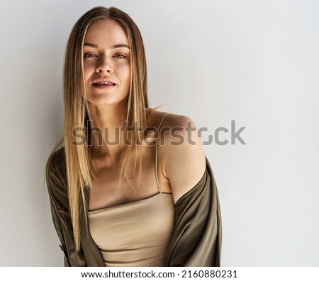 Portrait of beautiful blonde model with streight hair