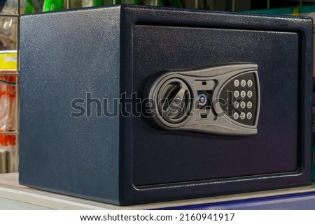 Safe for storing valuables or firearms. Background with copy space for text or lettering. Royalty-Free Stock Photo #2160941917