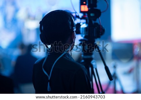 soft focus with video camera, videographer close up, cameraman, movie
 Royalty-Free Stock Photo #2160943703