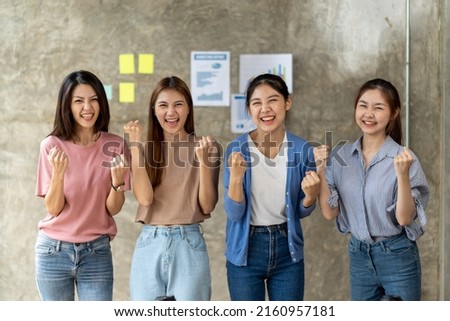 Group of asian Team laughing and cheerful in success meeting excited emotion. asian woman teamwork feeling happy, enjoy and engaged with achievement project.